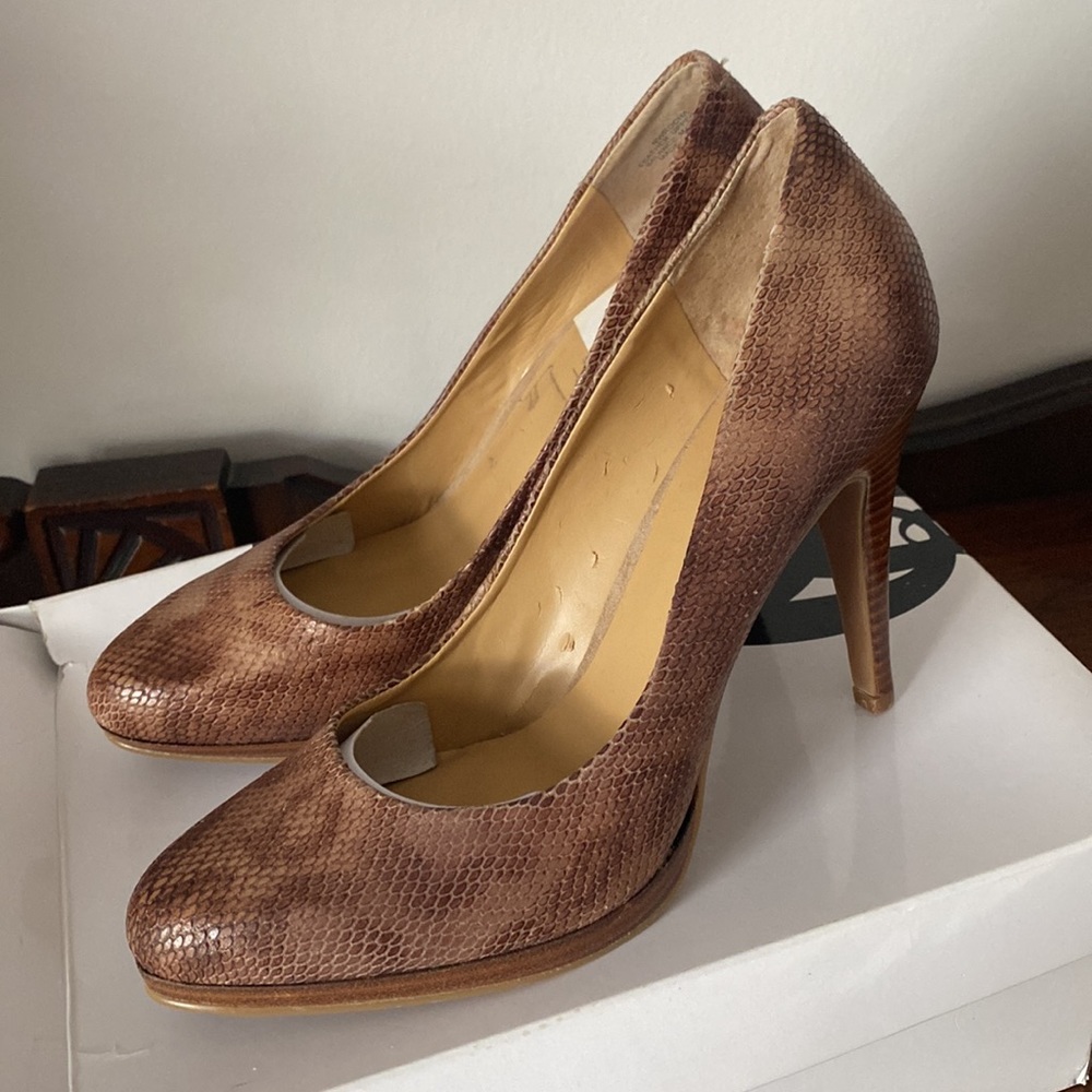 30:08  Nine West Python Platform Pumps